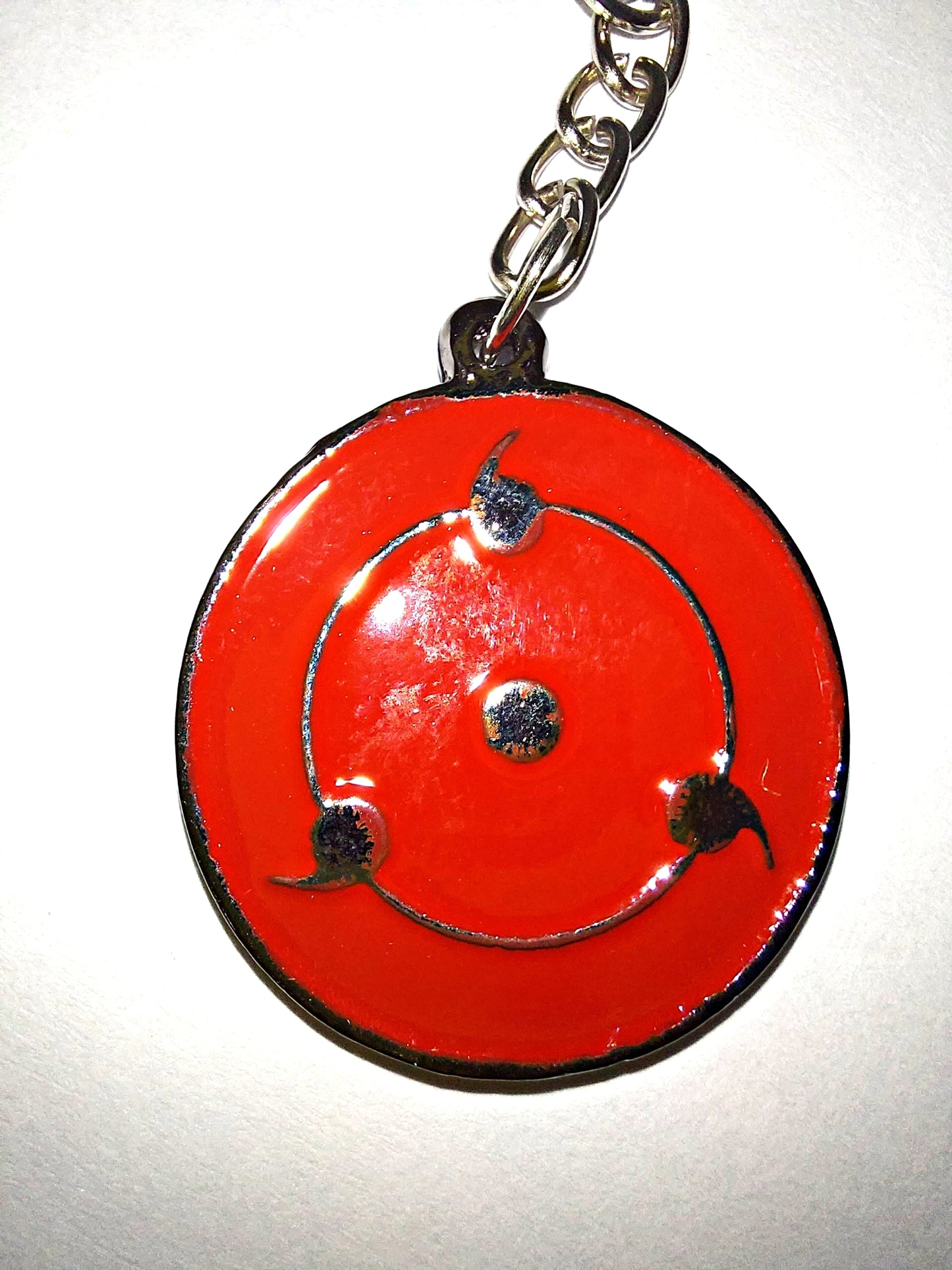Mangekyo Sharingan Itachi / Sharingan 3 aspas (colgante o llavero)