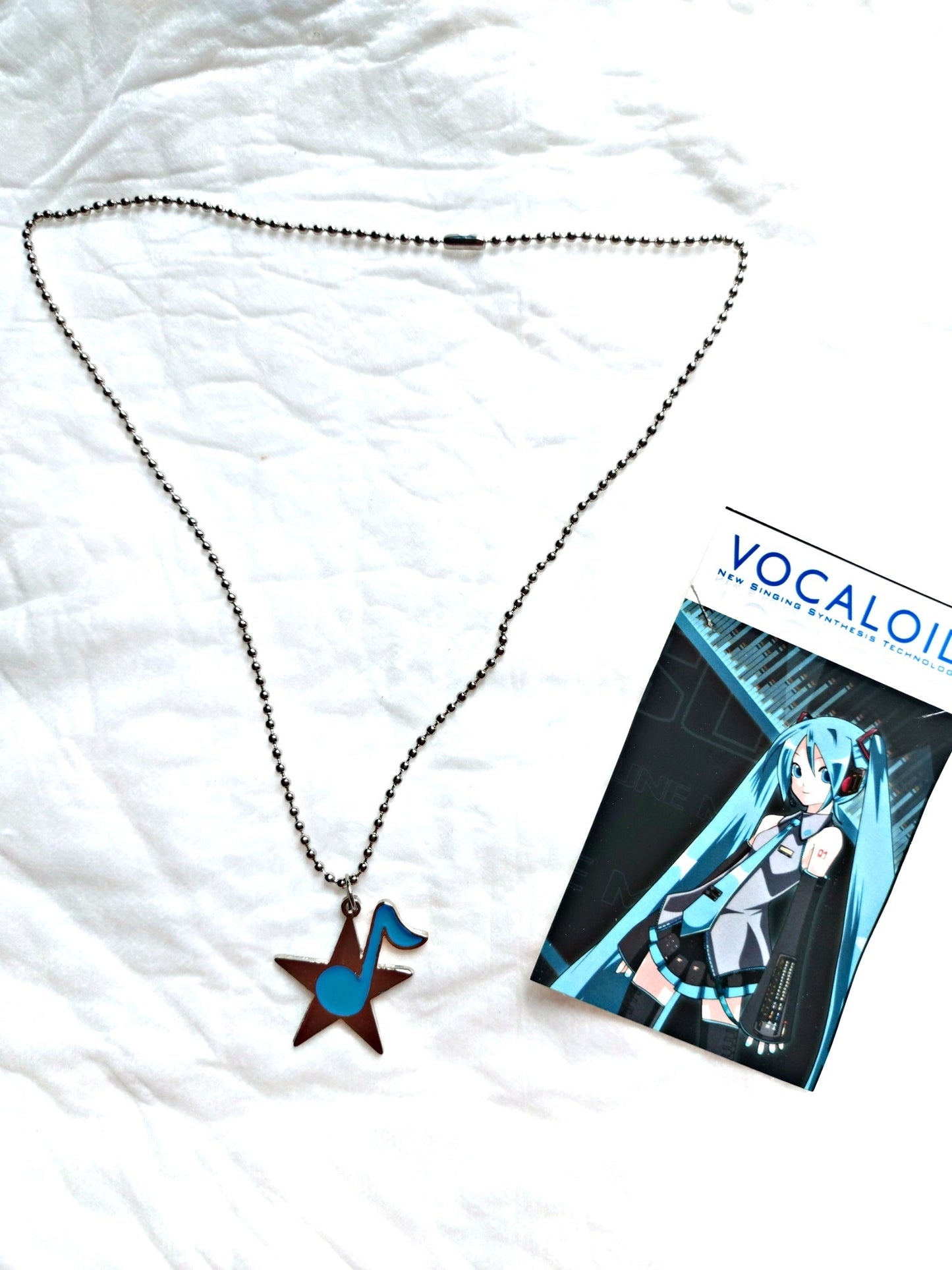 Vocaloid - Estrella con nota musical (colgante o llavero)