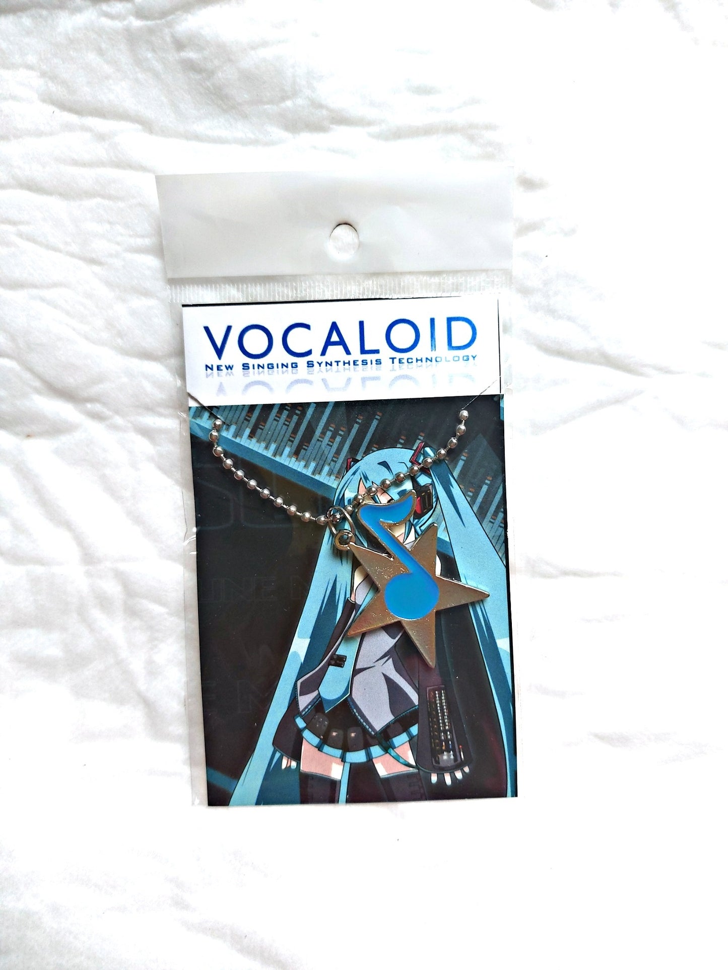 Vocaloid - Estrella con nota musical (colgante o llavero)